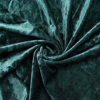 Dark green velvet fabric texture with swirling folds#whtbkgd
