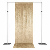 Gold sequined backdrop on adjustable stand for photography and events