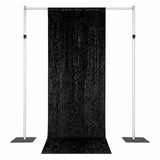 Black backdrop stand with support poles and base plates for photography studio