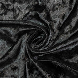 Black shiny velvet fabric texture with swirl folds#whtbkgd