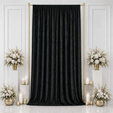 Black luxury curtain backdrop with gold stands and white floral arrangements