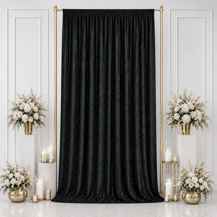 Black luxury curtain backdrop with gold stands and white floral arrangements