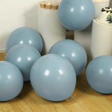 Light blue balloons on a wooden floor, perfect for celebrations.