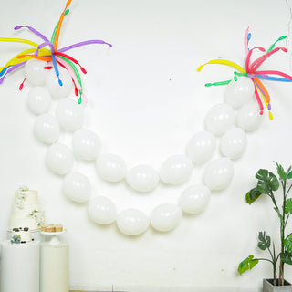 White balloon garland with colorful accents for party decoration