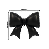 Black balloon bow decoration, 27 inches wide and 29 inches tall.