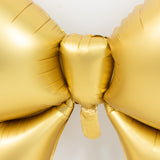 Gold balloon bow decoration for parties and celebrations