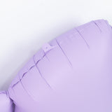 Purple inflatable balloon with a textured surface against a white background.