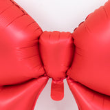 Red inflatable bow decoration for festive occasions