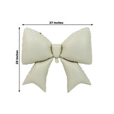 Oversized cream bow pillow measuring 27x29 inches