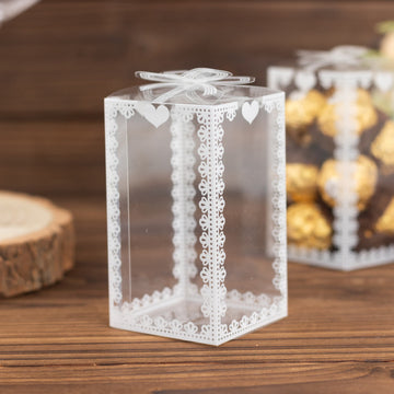 25 Pack Clear Rectangle Candy Gift Boxes With Bowknot and White Lace Pattern, 4" Transparent Plastic Party Favor Boxes - 2"x2"x4"