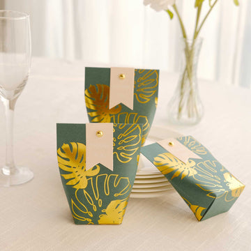 25 Pack Hunter Emerald Green Paper Pouch Candy Gift Bags With Gold Monstera Leaves Print, Party Favor Boxes with Pin and Tags - 4.5"x4"