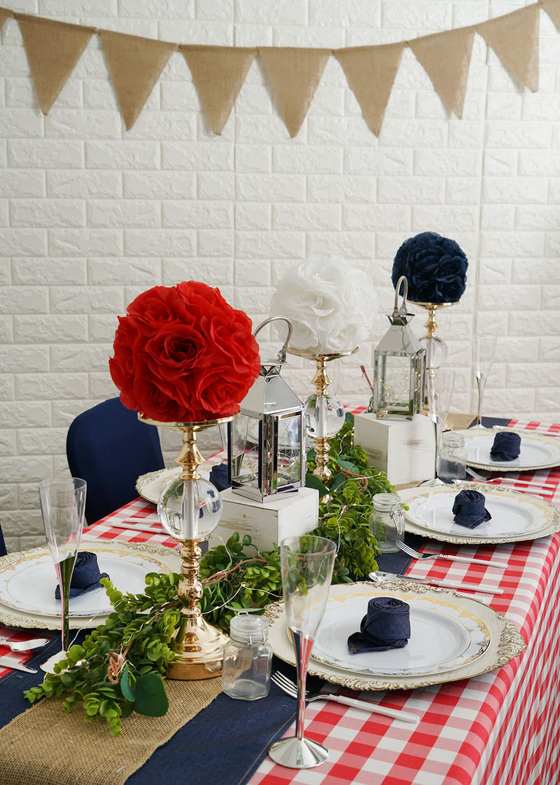 Red gingham tablecloth with navy runner and burlap overlay