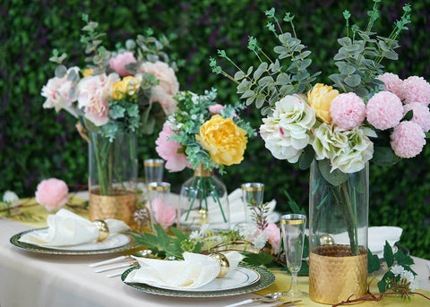 Summer tablescape with floral centerpieces