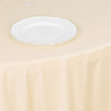 Experience Convenience and Allure with the Beige Premium Scuba Wrinkle-Free Round Tablecloth