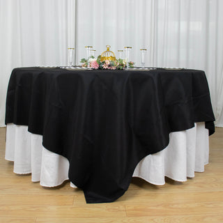 Elevate Your Event Decor with the Black Polyester Table Overlay
