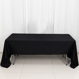 Elevate Your Event with the 60"x126" Black Rectangle 100% Cotton Linen Seamless Tablecloth