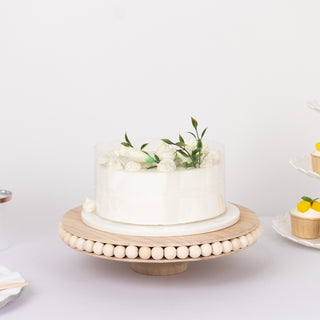 <span style="background-color:transparent;color:#000000;">Rustic Elegance: Natural Round Wooden Pedestal Cake Stand</span>