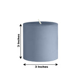 Blue pillar candle, 3 inches in diameter and height.