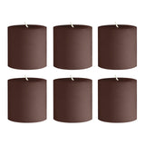 Set of six brown pillar candles on a plain white background. #whtbkgd
