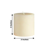 3-inch ivory pillar candle on a plain background