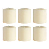 Set of six cream-colored pillar candles on a white backdrop. #whtbkgd