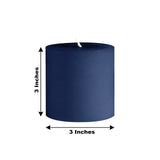 Navy blue pillar candle, 3 inches tall and 3 inches wide.