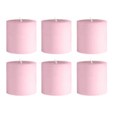 Set of six pink pillar candles on a white background. #whtbkgd