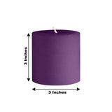 Purple pillar candle, 3 inches tall and 3 inches wide.