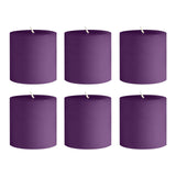 Set of six purple pillar candles on white background #whtbkgd