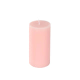 Pink pillar candle on a plain white background #whtbkgd