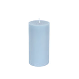 Light blue pillar candle on a plain background #whtbkgd