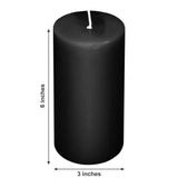 Black pillar candle, 6 inches tall and 3 inches wide