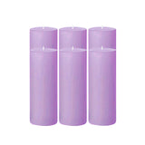 Set of four lavender pillar candles in varying heights #whtbkgd