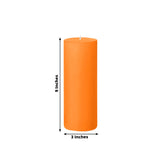 Orange pillar candle, 9 inches tall and 3 inches wide.