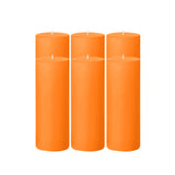 Set of four vibrant orange pillar candles #whtbkgd