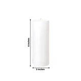 White pillar candle, 9 inches tall and 3 inches wide.