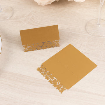 50 Pack Gold Wedding Table Number Cards with Laser Cut Leaf Vine Design, Printable Reservation Seating Name Place Cards - 210 GSM