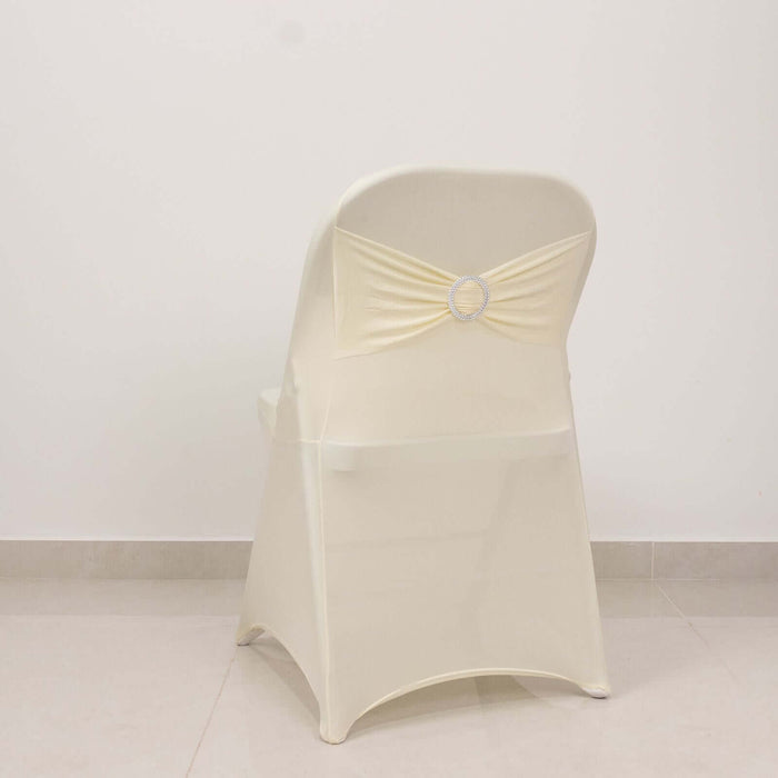 Ivory Spandex Folding Chair Covers with Silver Rhinestone Buckled Sash Band