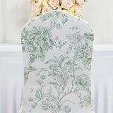 Floral patterned chair cover with green designs on a light background.