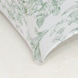 Floral patterned tablecloth corner with green design on white background.