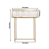 Modern gold console table with glass top and unique design, 40x12x48 inches.