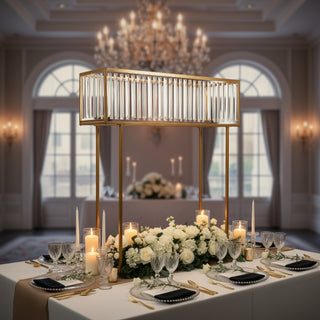 Elegant dining table centerpiece with candles and flowers in a luxurious setting.
