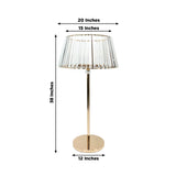 Gold floor lamp with crystal shade, dimensions: 20x15x38 inches.