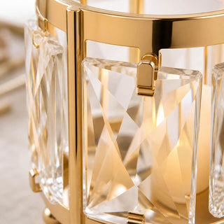 Gold crystal chandelier close-up with faceted glass and modern luxury design