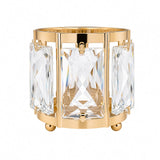 Gold crystal candle holder with faceted glass panels on a white background#whtbkgd