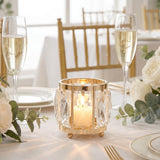 Elegant gold crystal candle holder centerpiece on a wedding table setting