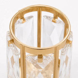Gold and crystal luxury vase with faceted glass design