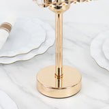 Gold lamp base with crystal detail on a marble surface.