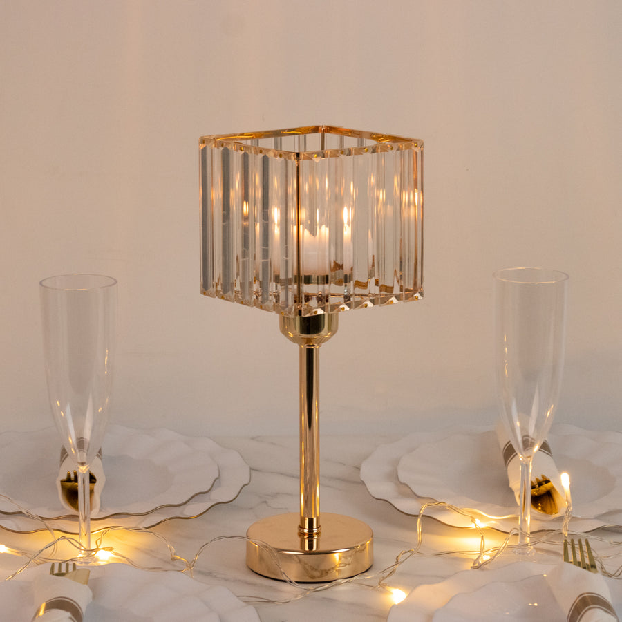 Elegant crystal table lamp with gold accents on a dining table setting.