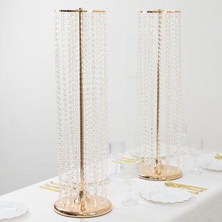 Elegant crystal bead table lamps with gold accents on a dining table.